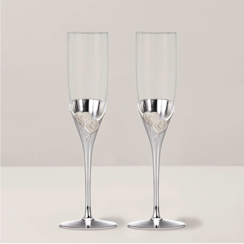 Elegant Silver Champagne Flutes with Heart Design